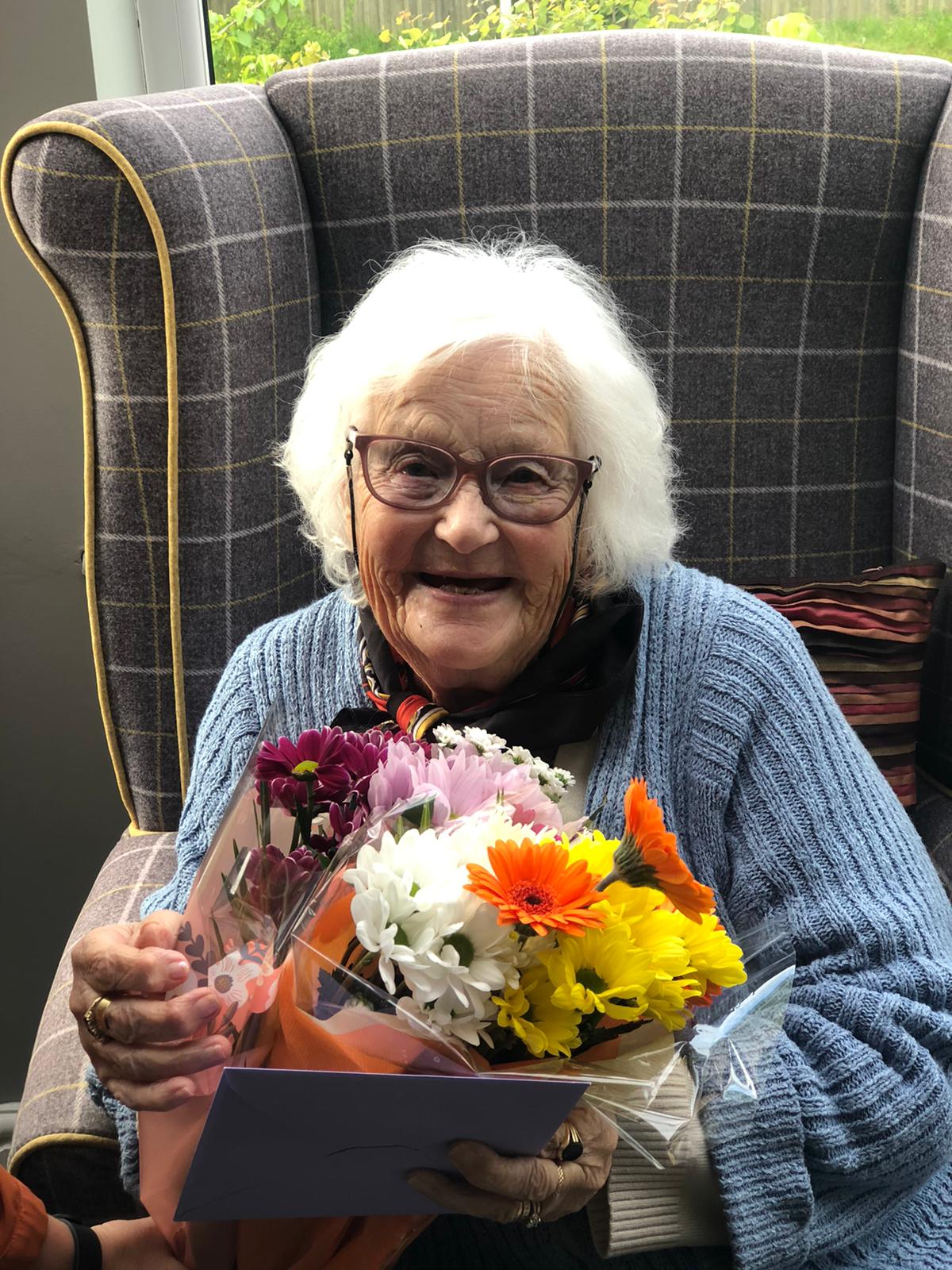 Margaret with her birthday flowers