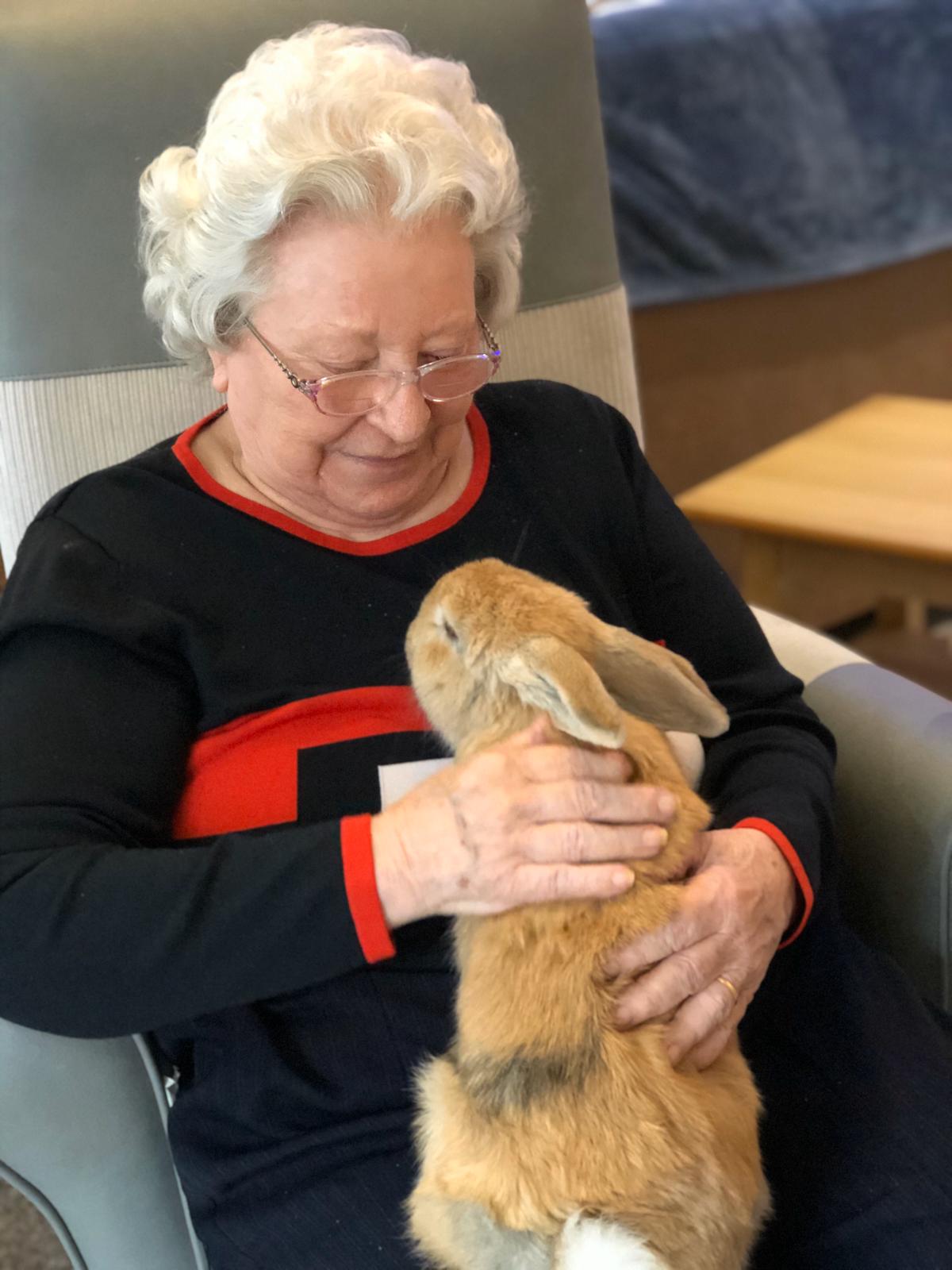Pauline holding Flopsy the Rabbit 